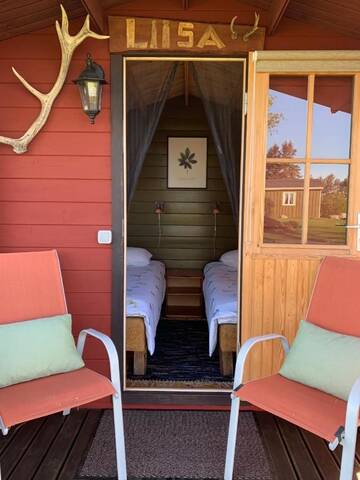 Фото номера Бунгало с видом на сад Дома для отпуска Muha Beach Holiday Home г. Riksu 4