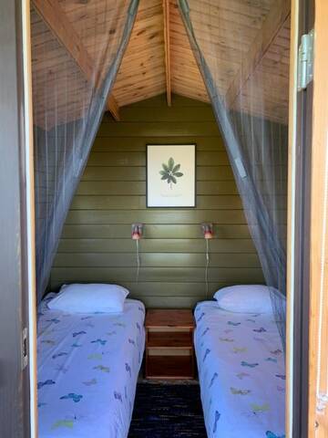 Фото номера Бунгало с видом на сад Дома для отпуска Muha Beach Holiday Home г. Riksu 5