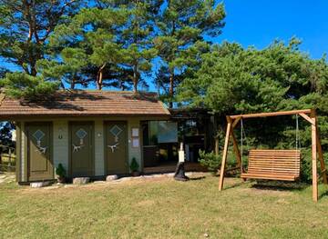 Фото номера Бунгало с видом на сад Дома для отпуска Muha Beach Holiday Home г. Riksu 6